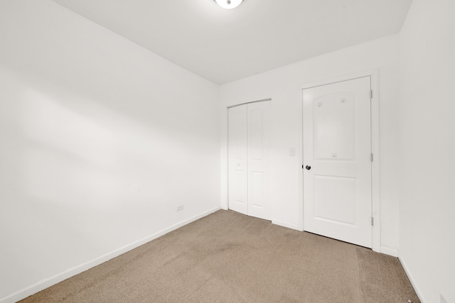 unfurnished bedroom featuring carpet floors