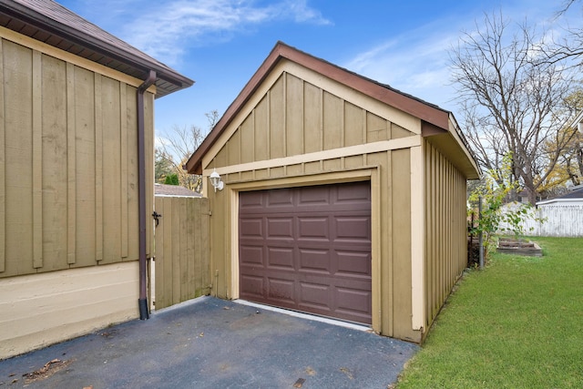 garage with a lawn