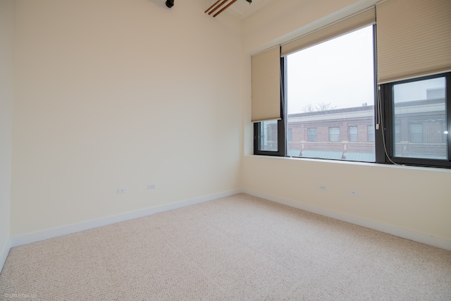 spare room with carpet flooring