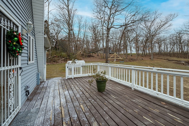 deck featuring a yard