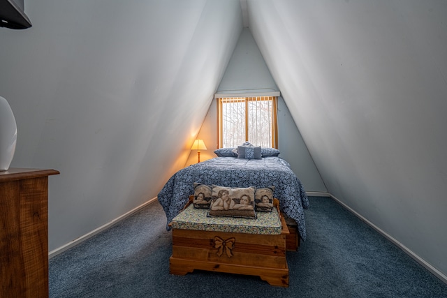 carpeted bedroom with vaulted ceiling