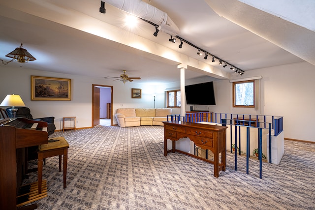 recreation room with ceiling fan, carpet floors, and track lighting