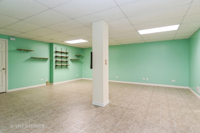 basement with a drop ceiling