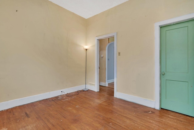 spare room with light hardwood / wood-style floors