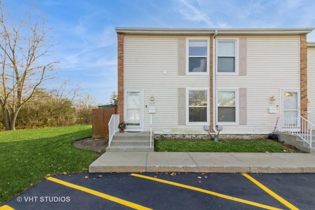 exterior space with a front yard