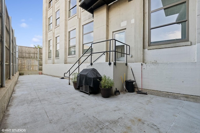 view of patio / terrace with fence and area for grilling