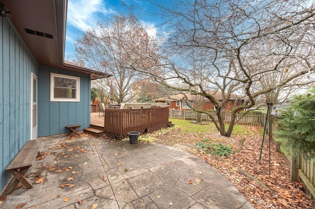 view of patio with a wooden deck