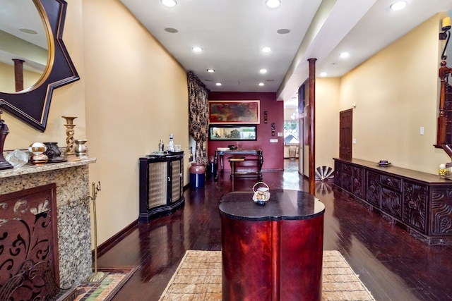 interior space with dark hardwood / wood-style flooring