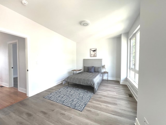 sitting room with light hardwood / wood-style flooring