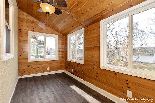 unfurnished sunroom featuring lofted ceiling, ceiling fan, and wooden ceiling