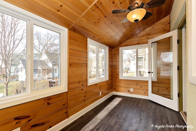 unfurnished sunroom with ceiling fan, wooden ceiling, and lofted ceiling