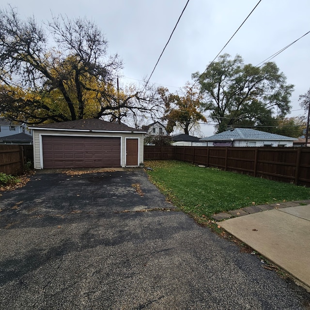 garage with a lawn