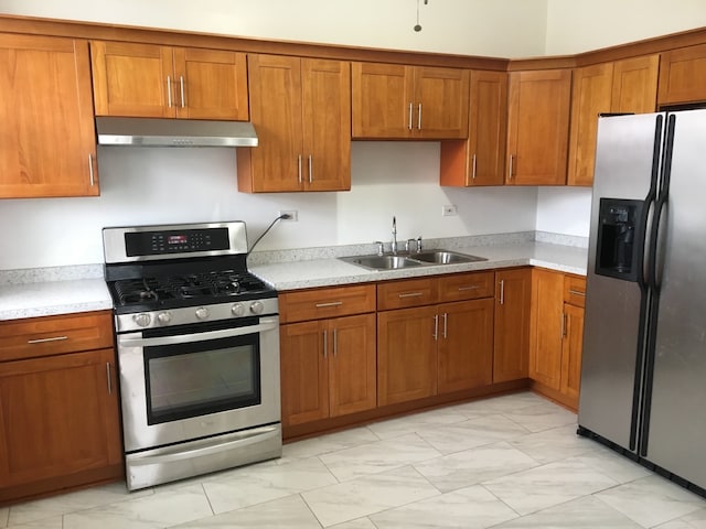 kitchen with sink and stainless steel appliances