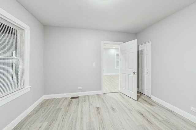 unfurnished bedroom featuring light hardwood / wood-style floors