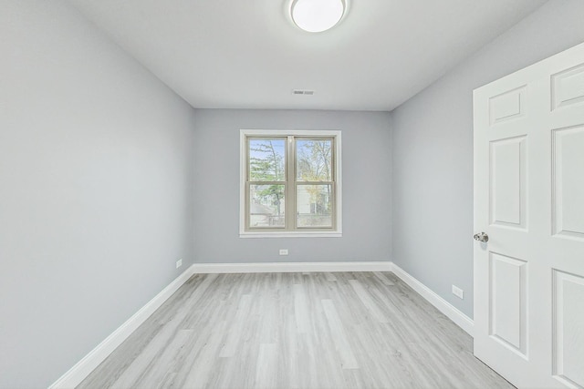 empty room with light wood-type flooring