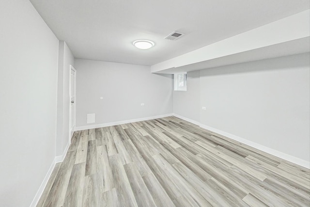 basement with light wood-type flooring