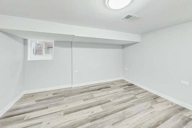 basement with light wood-type flooring