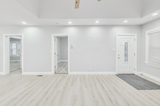 entryway featuring ceiling fan and light hardwood / wood-style flooring