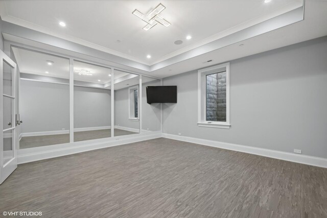 unfurnished dining area with light wood-type flooring, ornamental molding, and an inviting chandelier