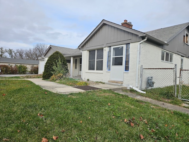 view of home's exterior featuring a yard