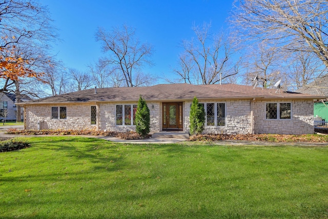 ranch-style home featuring a front yard