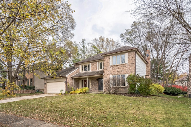 view of front property featuring a front lawn and a garage