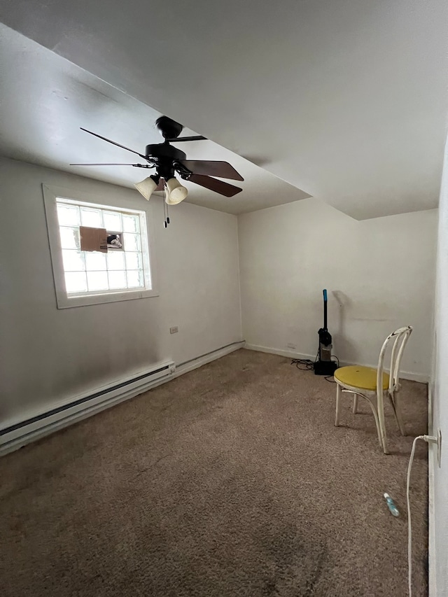 interior space with carpet, baseboard heating, and ceiling fan