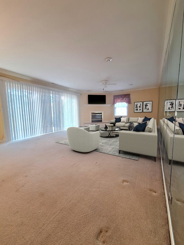 living room with carpet floors and ceiling fan