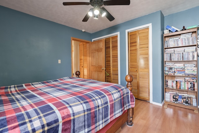 living room featuring ceiling fan and light hardwood / wood-style flooring