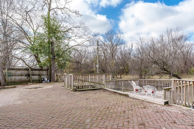 view of patio with a wooden deck