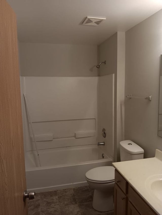 full bathroom with shower / washtub combination, vanity, and toilet