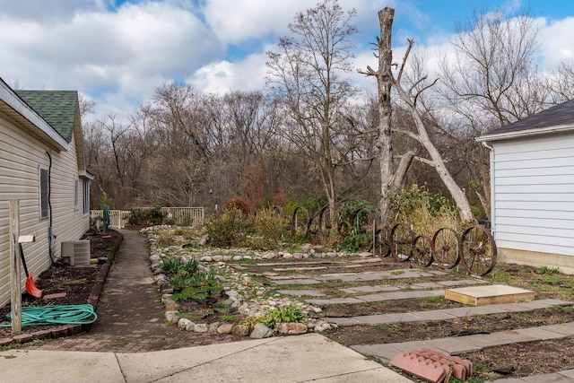 view of yard featuring central AC