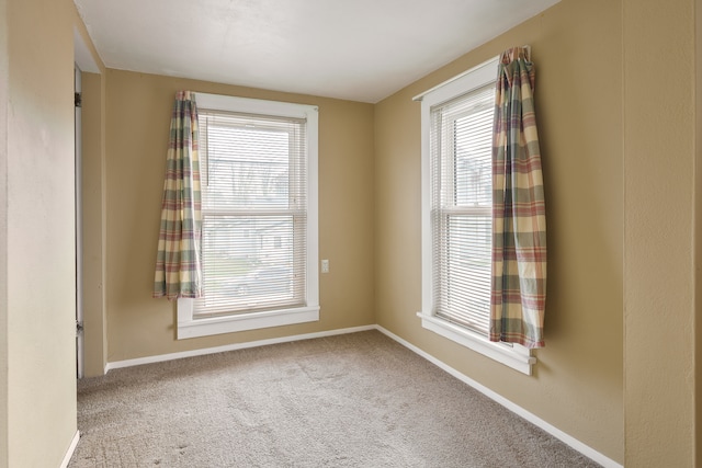 view of carpeted spare room