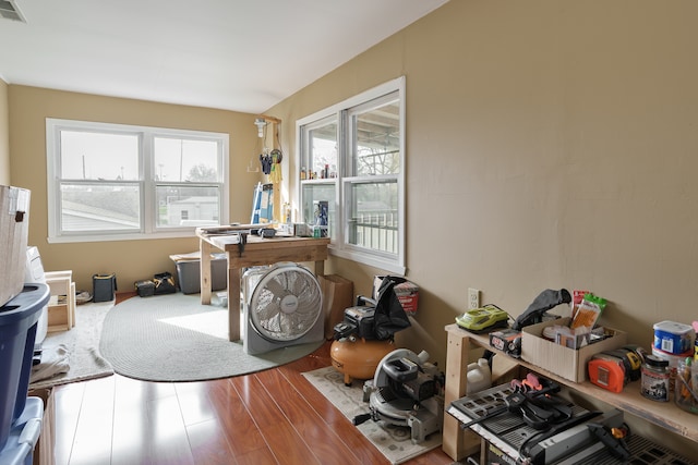 miscellaneous room with hardwood / wood-style floors