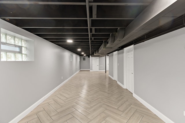 basement with light parquet flooring