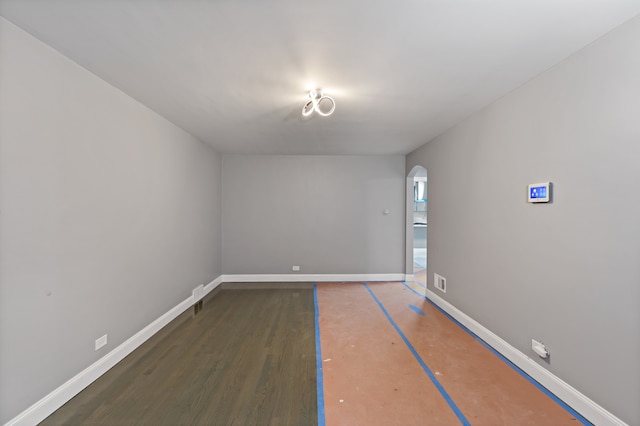 empty room featuring dark hardwood / wood-style floors