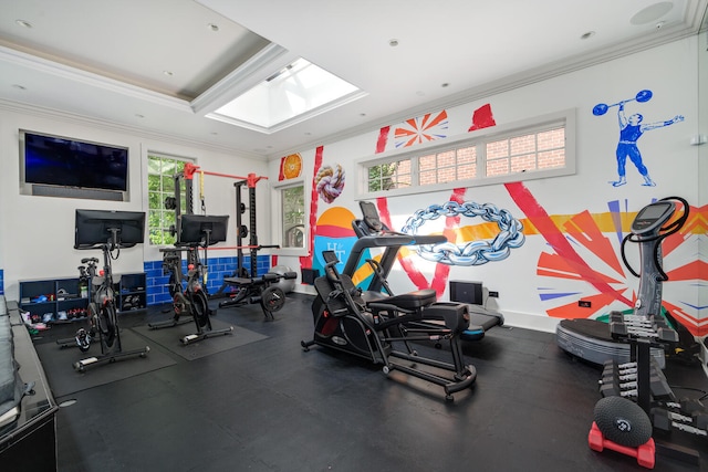 gym featuring crown molding