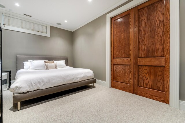 460 W Huron St, Chicago, IL 60654 - carpeted bedroom with ornamental molding, recessed lighting, and baseboards