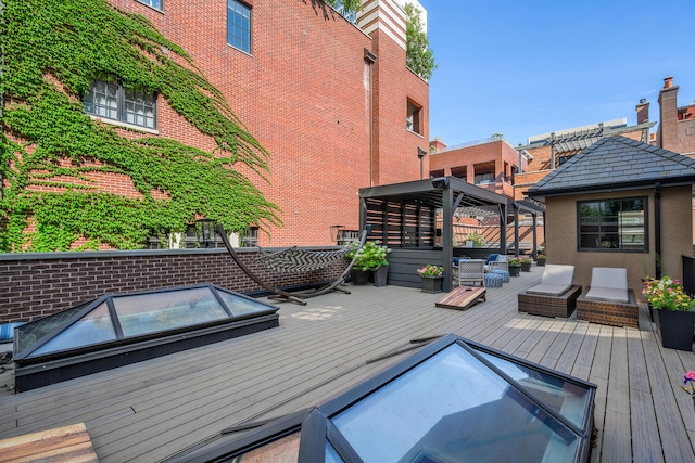 wooden deck with an outdoor hangout area