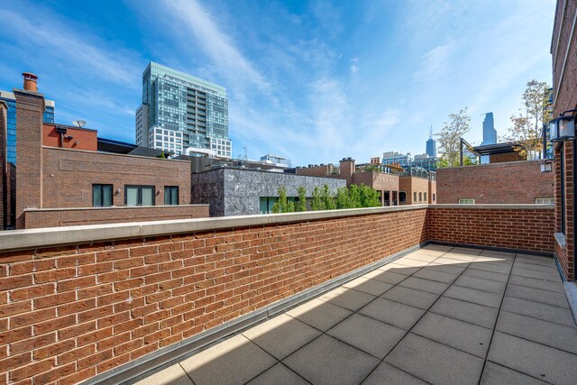 460 W Huron St, Chicago, IL 60654 - view of patio with a balcony and a city view