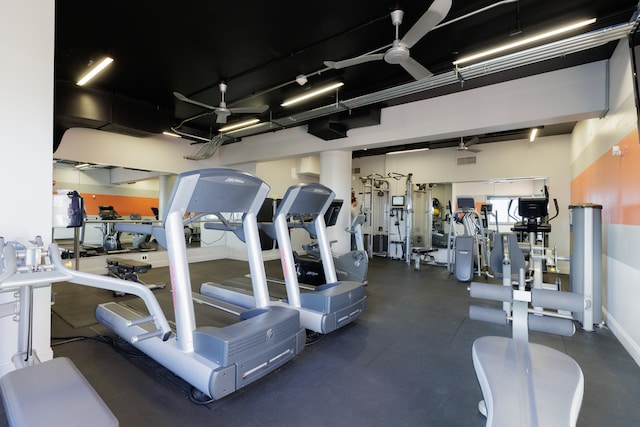 workout area featuring ceiling fan