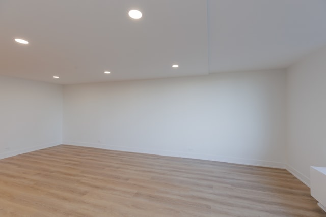 spare room with light wood-type flooring