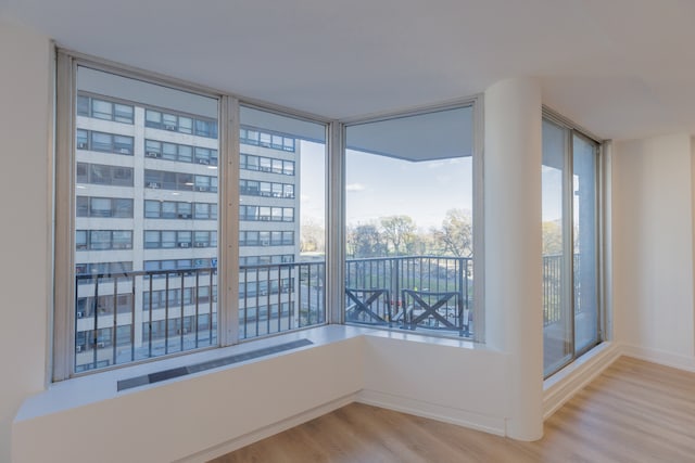 empty room featuring hardwood / wood-style flooring