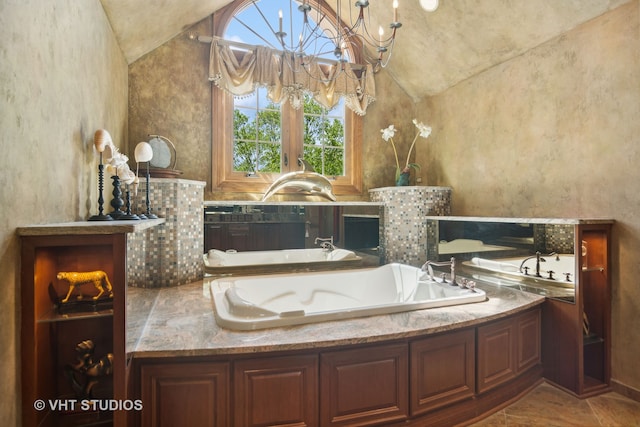 bathroom with a bathing tub, tile patterned flooring, lofted ceiling, and a notable chandelier