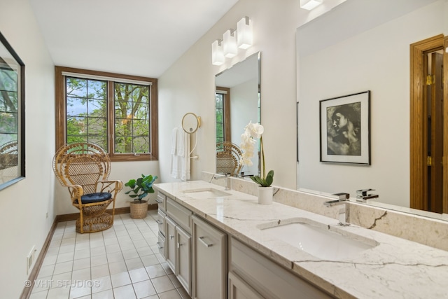 bathroom featuring tile patterned floors and vanity