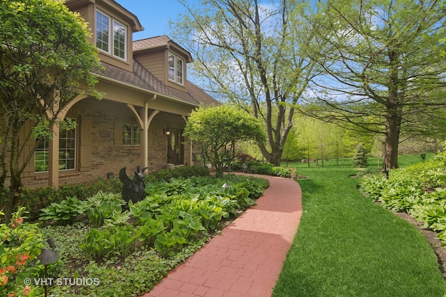 view of yard featuring a porch