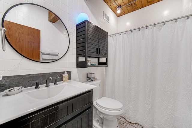 bathroom featuring toilet, wooden ceiling, and tile walls