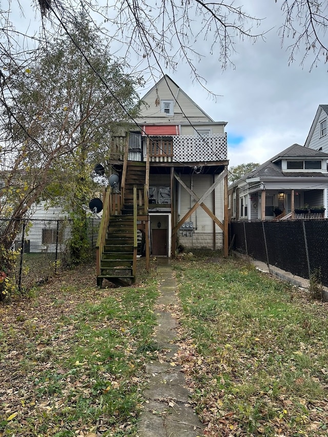 rear view of house with a deck