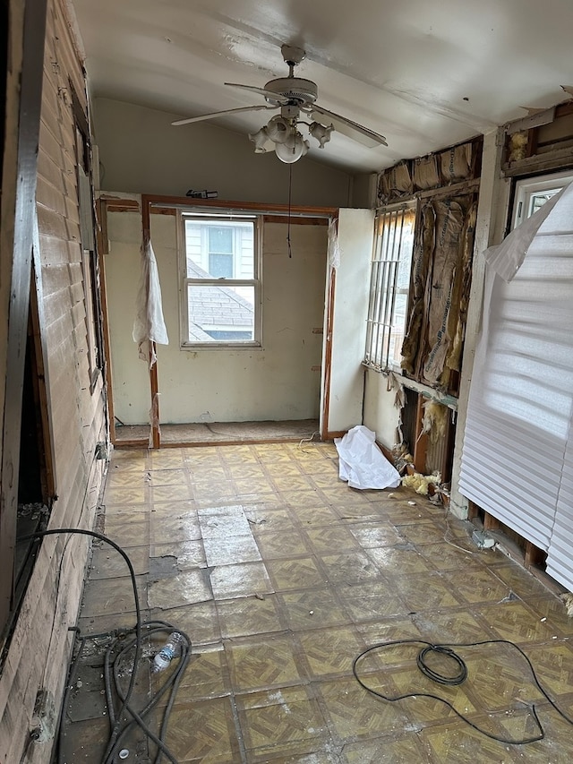 interior space featuring ceiling fan