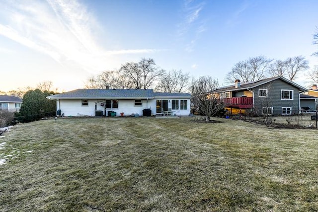 view of front of home with a yard